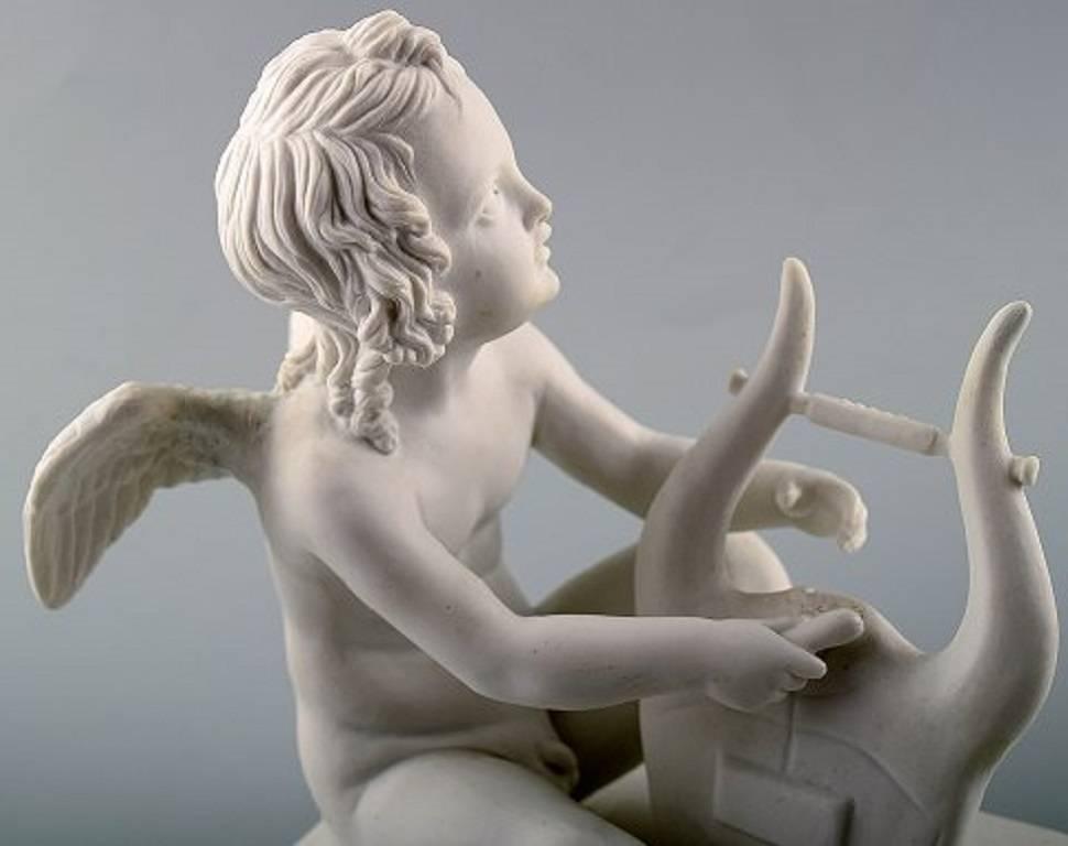 Antique Royal Copenhagen biscuit figure. Cupid, angel.

Measures: 15 x 15 cm. 

1st. factory quality. In good condition. 

Stamped late 19th century.