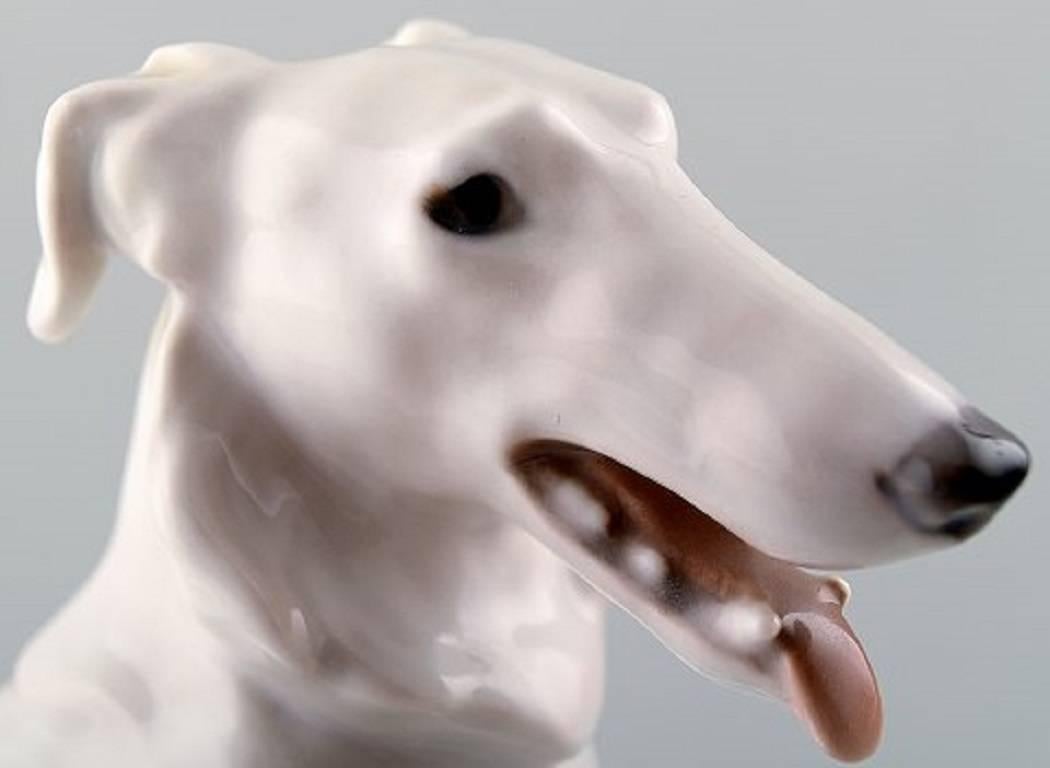 Bing & Grondahl Borzoi.

B&G 1814 Borzoi sitting.

Designed by Lauritz Jensen.

Measures 23 cm.

In perfect condition. 1st. factory quality.