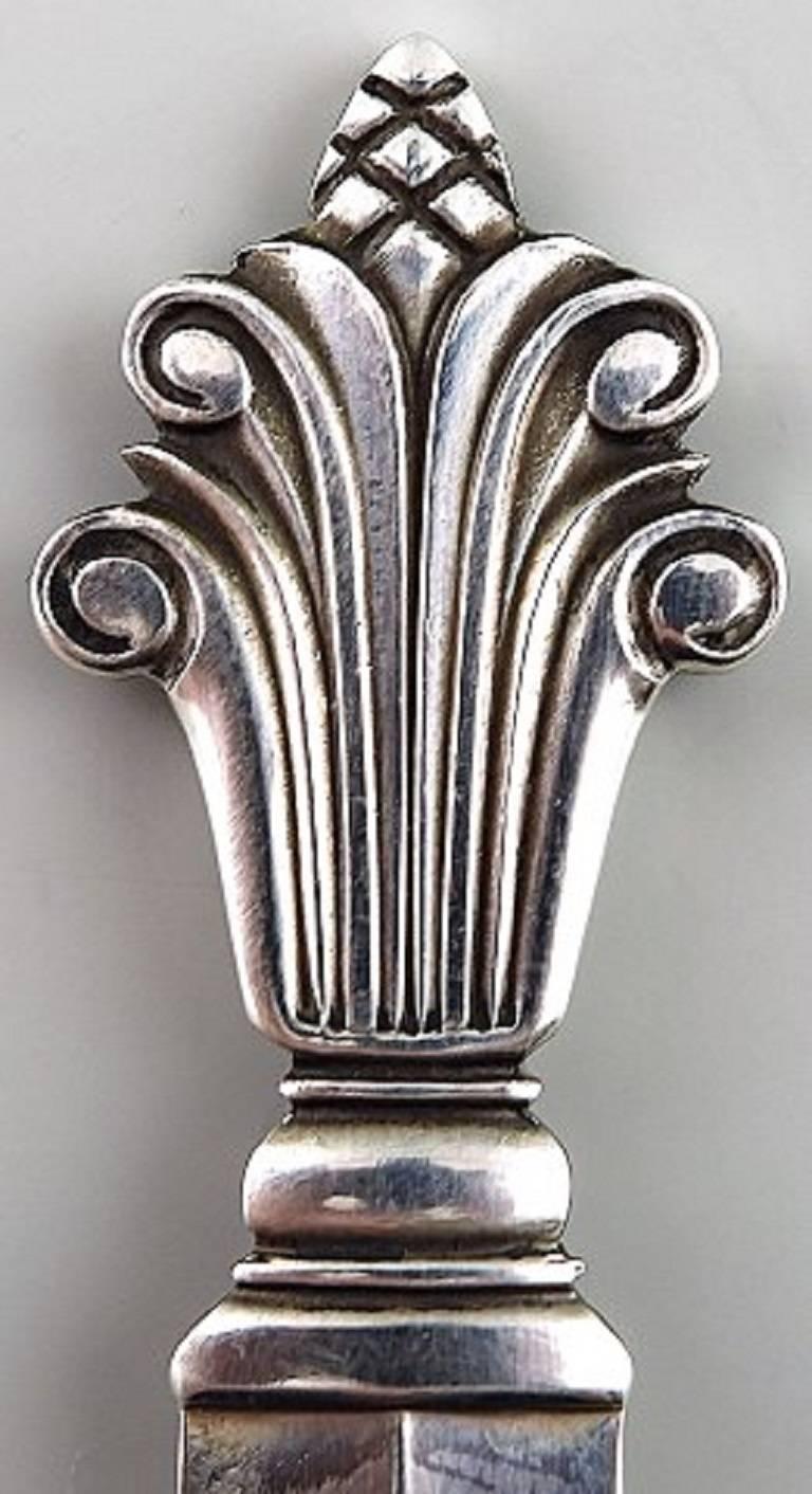 12 Georg Jensen acanthus sterling silver 12 coffee spoons.

Measures: 11.5cm.

Marked.

In very good condition.