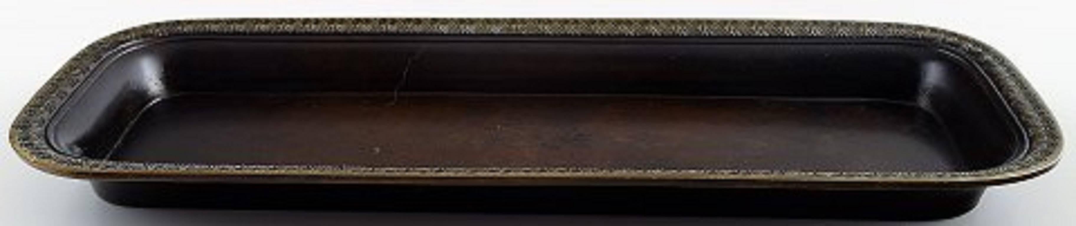 Just Andersen Art Deco pen tray in bronze,

Denmark, 1930s.

Measures: 27 x 10 cm.

Stamped: B 97.

In very good condition.