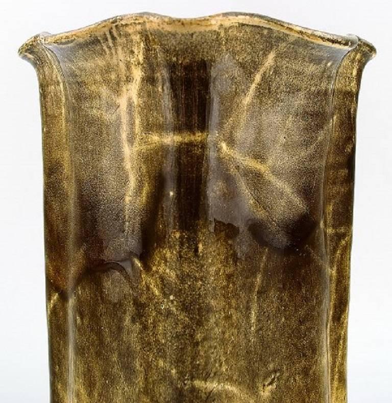 Kähler, HAK, Svend Hammershöi, glazed stoneware vase.

In perfect condition.

Beautiful yellow glaze.

Marked.

Measures 20 x 12cm.