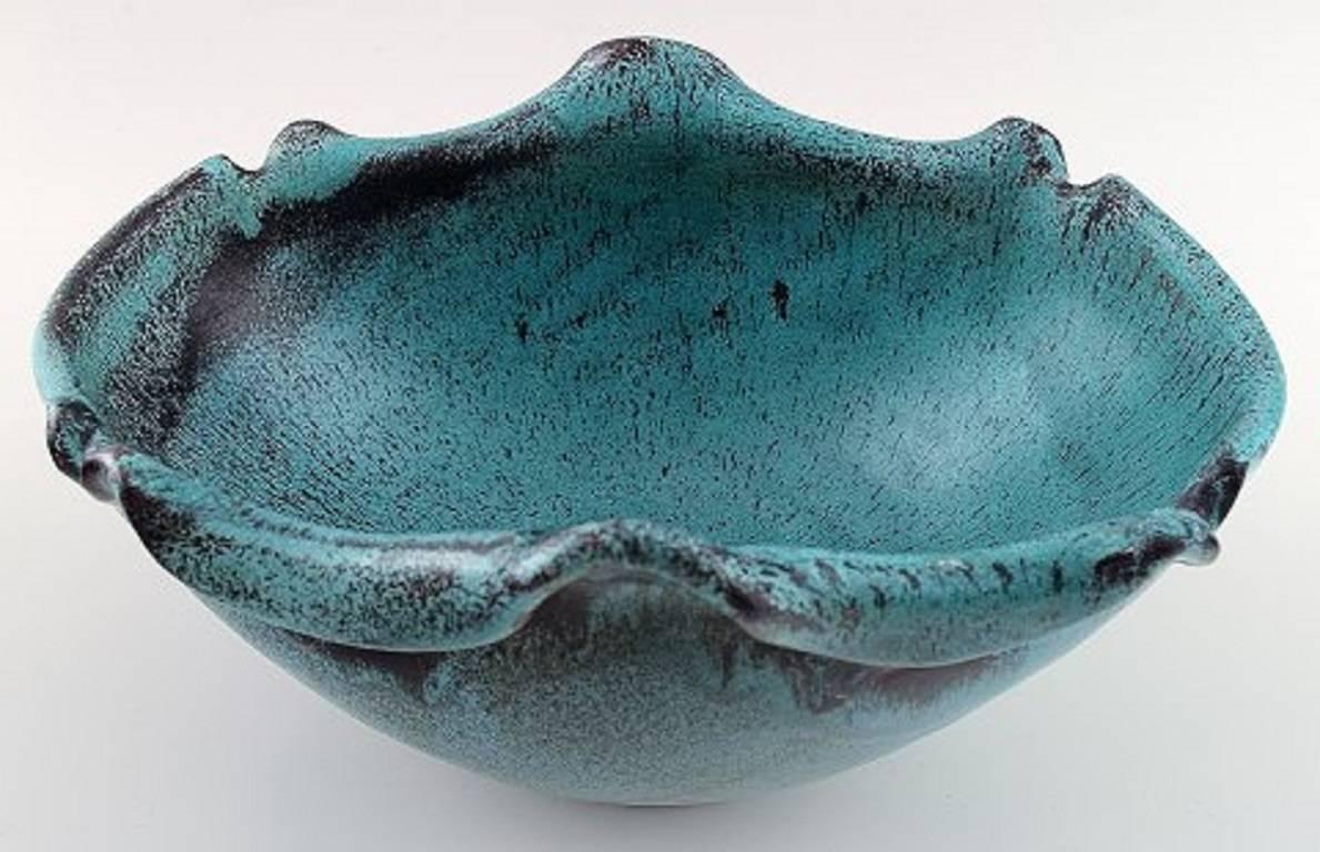 Kähler, HAK, glazed ceramic bowl, 1930s.

Designed by Svend Hammershøi. Turquoise Green double glaze.

Measures 21 x 11 cm.

Marked.

In perfect condition.