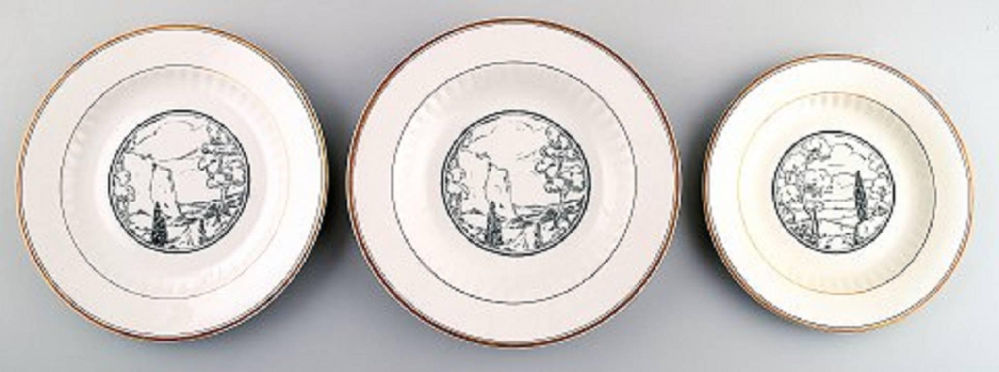 Wilhelm Kåge, Gustavsberg. Dinner service 'Landscape' in earthenware.

Consisting of: Tureen with lid, sauceboat, eight dinner plates (25 cm.), eight soup plates (25 cm.) and eight lunch plates (21.5 cm.),

Sweden, 1930s.

In good condition.