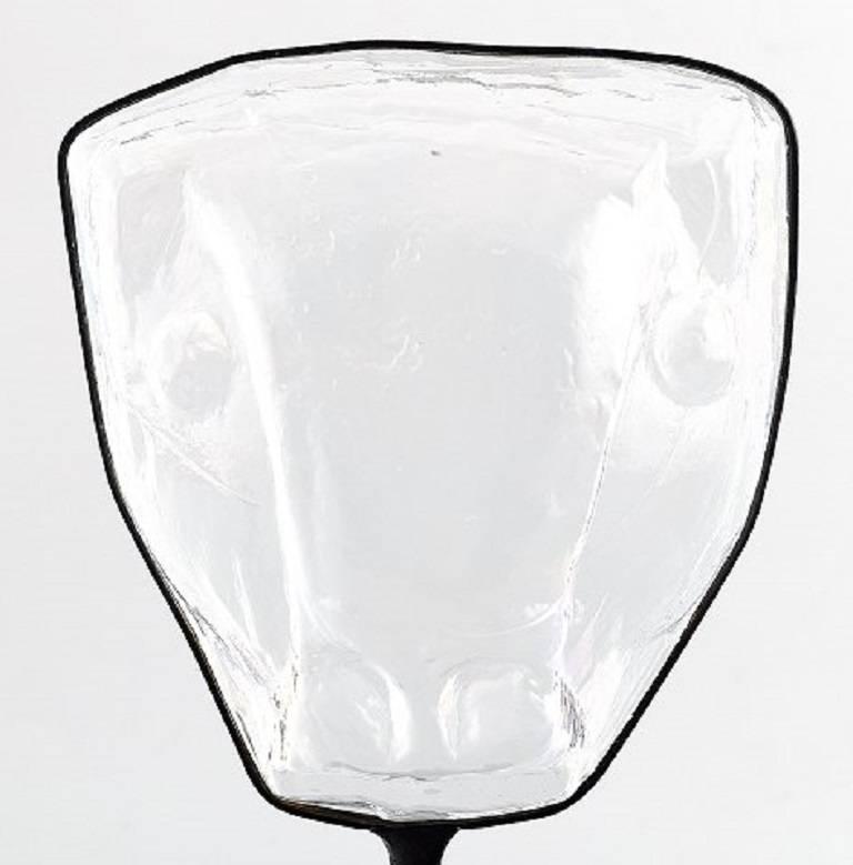 Erik Höglund for Kosta Boda, sculpture in art glass with stand in wrought iron.

Stamped: Boda, Sweden, 1980s.

Measures: 13 x 25.5 cm.