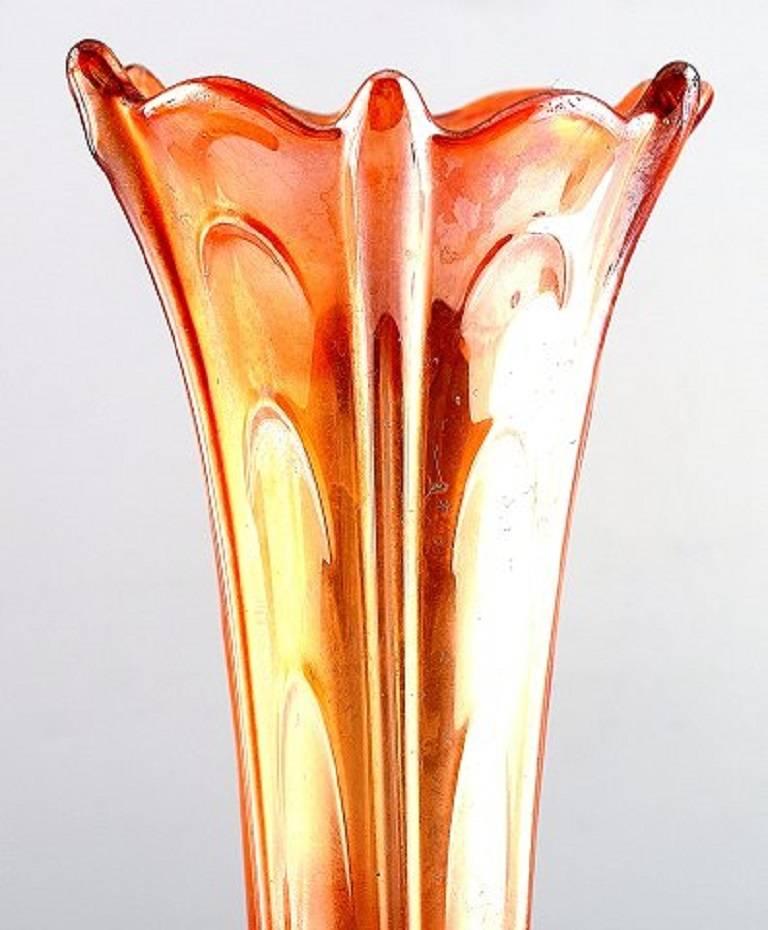 A pair of American pressure glass vases, mid-20th century.

Red and yellow decoration.

Measures: 30 cm.

In good condition.