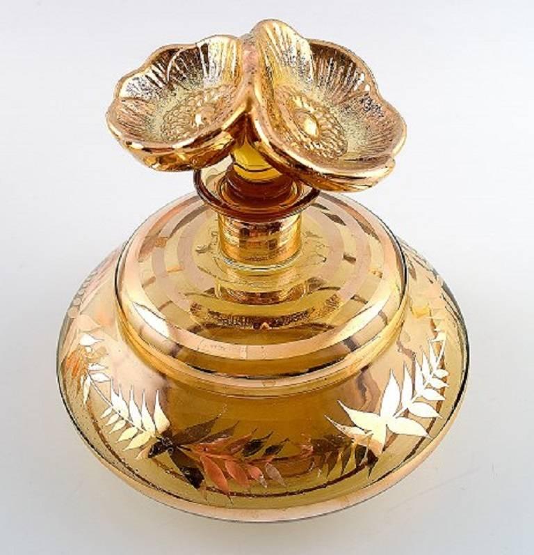 Four perfume bottles, art glass.

Not stamped.

In perfect condition.

The largest measures 16 cm.