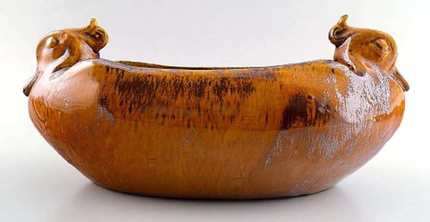 Karl Hansen Reistrup for Kähler, bowl with ducks, uranium yellow glaze.

In very good condition.

Measures 28 x 11 cm.

Marked.