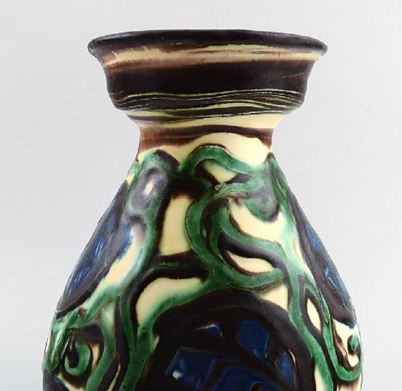 Kähler, Danemark, vase en grès émaillé, années 1930.

Magnifique glaçage.

Marqué.

Mesures : 20 cm.

En parfait état.