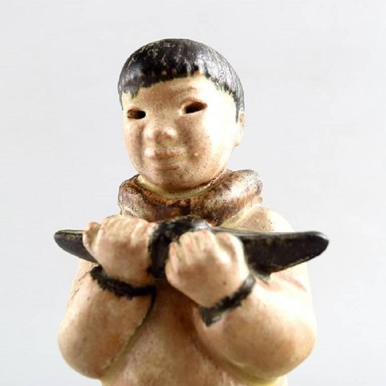Rare Arne Ingdam, Denmark, 1960s. 

Eskimo boy with kayak in his hands, ceramics.

In perfect condition.

Stamped.

Measures: 16 cm.
