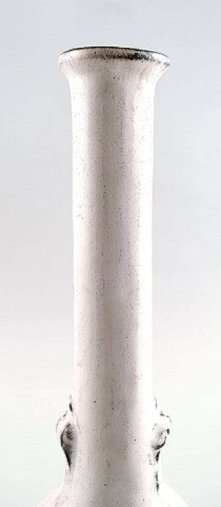 Svend Hammershøi for Kähler, HAK, glazed narrow-neck vase, 1930s.

Designed by Svend Hammershøi. 

Double glaze in black and gray.

Measures 28 x 11 cm.

Marked.

In perfect condition.