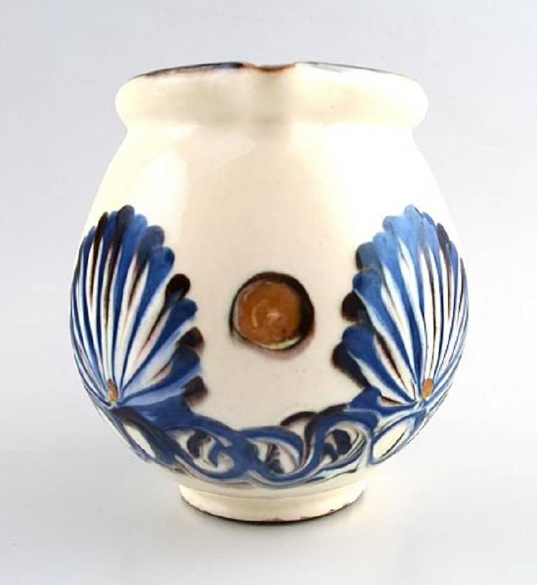 Kähler, Denmark, glazed stoneware pitcher, 1930s.

Beautiful glaze.

Marked.

Measures: 12 x 15 cm.

In perfect condition.