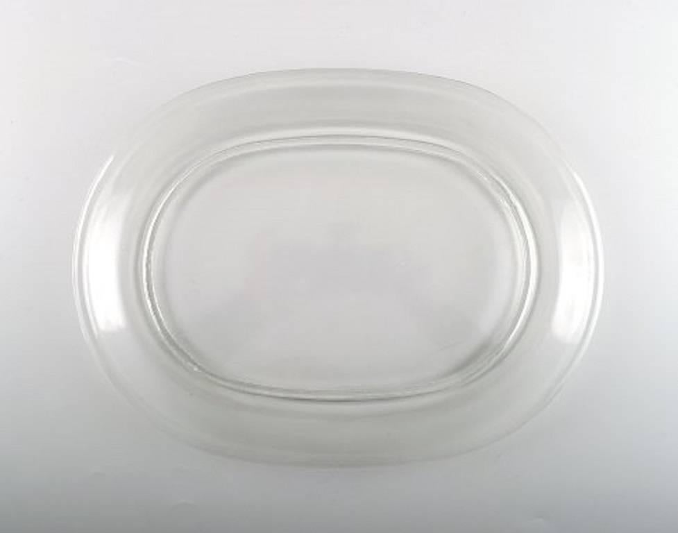 Platos de langosta, cinco platos de cristal transparente de Josef Frank.

Producido en: Svenskt Tenn, Reijmyre / Gullaskruf,

Suecia, mediados del siglo XX.

En buen estado.

Medidas: 30 cm. de largo.