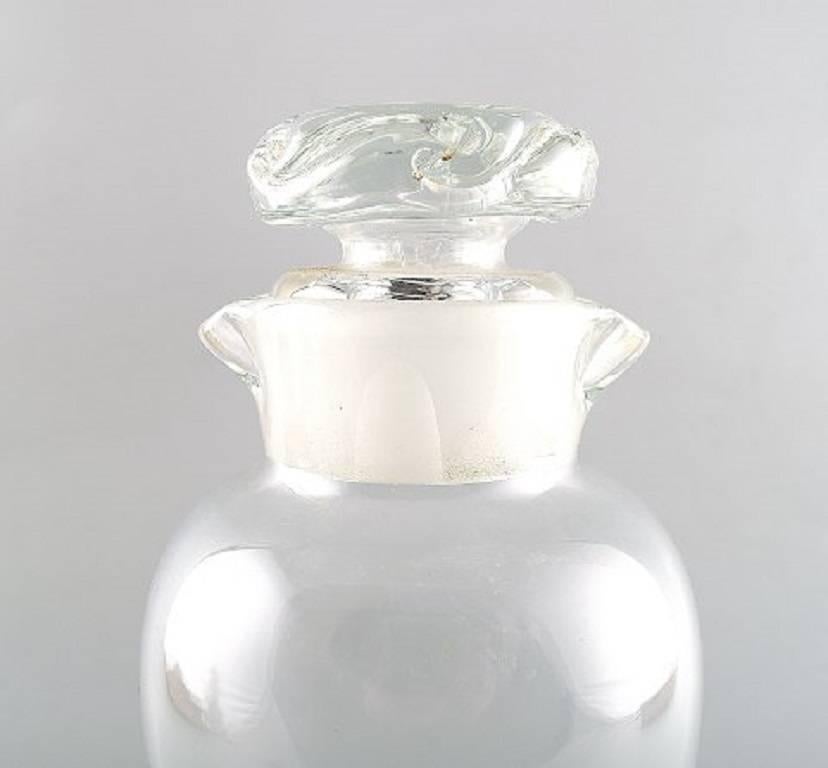 Pichet à cocktail/shaker en verre transparent, verre d'art moderne suédois, années 1960.

Mesures : 25.5 cm.

En parfait état.

Sans timbre.