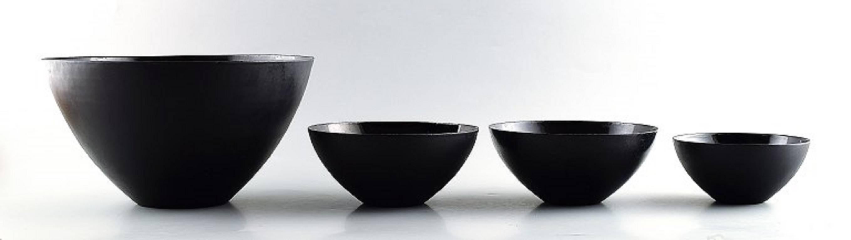 Four Krenit bowls by Herbert Krenchel. Black metal and black enamel,

1970s.

The bowls are measuring 25 cm and 16 cm and 12.5 cm in diameter.

In perfect condition.

Hallmarked. Krenit, Denmark.