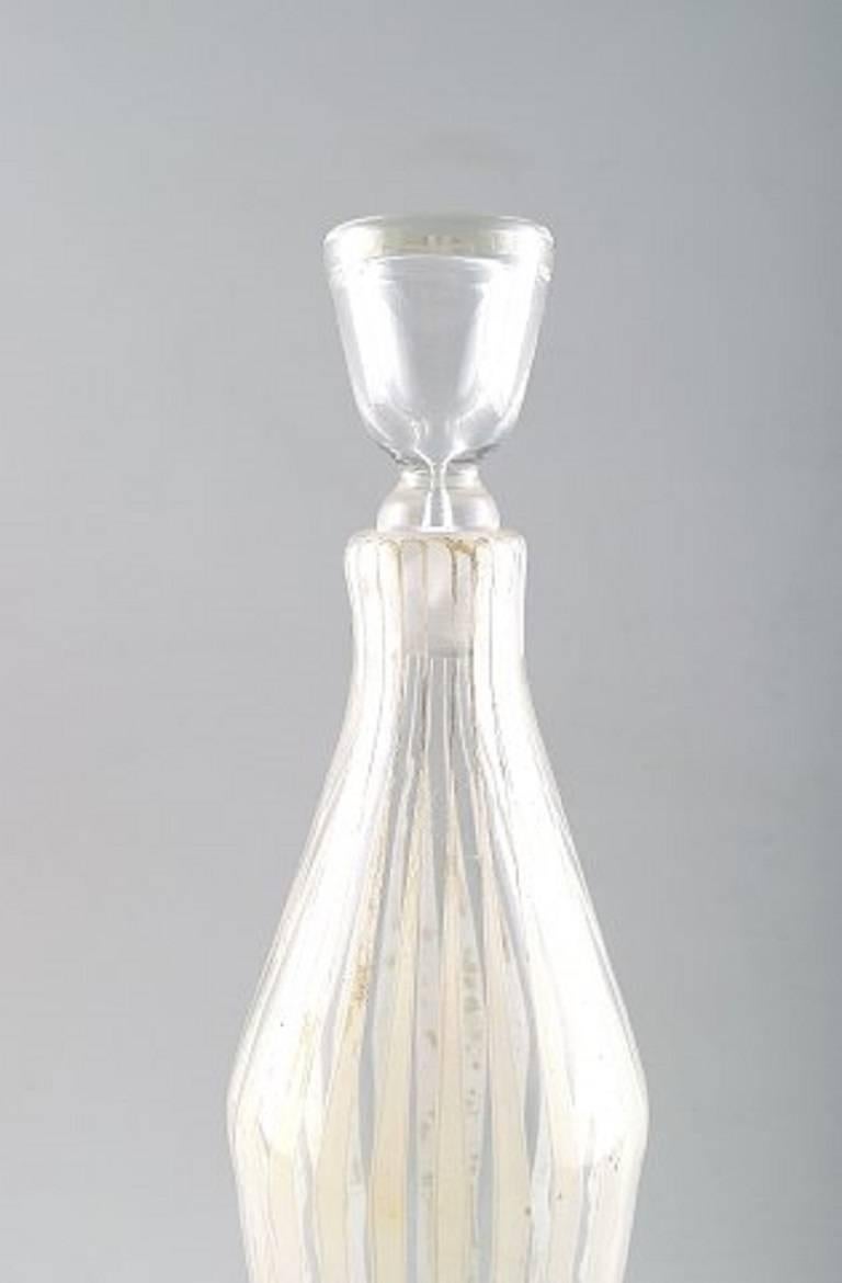 Decanter "Strict", Bengt Orup, Johansfors, Sweden.

Designed in 1952.

Height 31 cm.

In perfect condition.