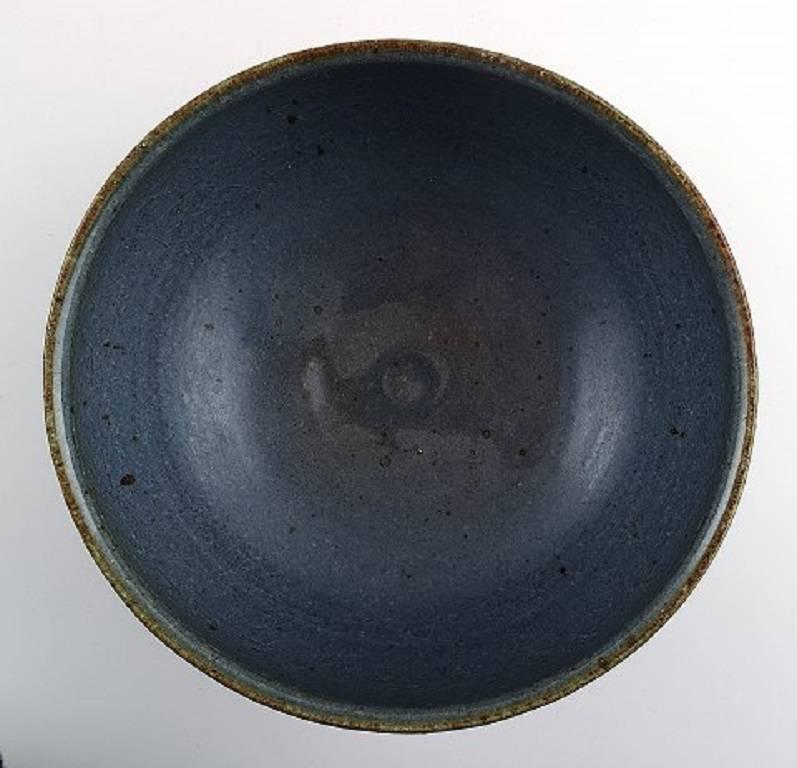 B&G, Bing & Grondahl, Valdemar Pedersen stoneware bowl,

1930s.

Blue glaze. 1 factory quality.

Perfect condition.

Measures: 18.5 cm x 9 cm.