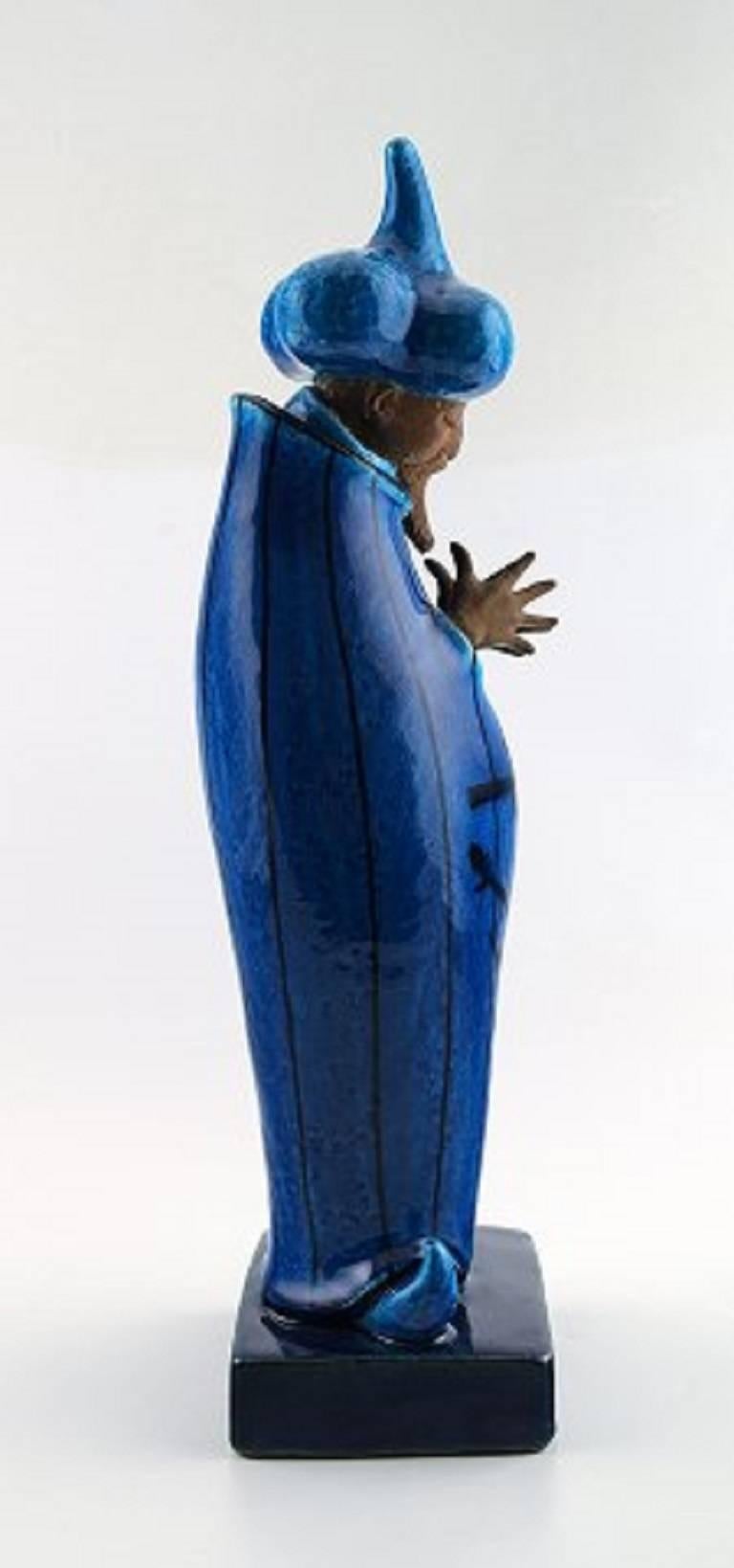Johannes Hedegaard (1915-1999) for Royal Copenhagen. 

'Grand Vizier' figure of partially glazed stoneware.

Signed Johannes Hedegaard, no. 21700. 

Designed in 1959.

In perfect condition. 1st. factory quality.

Measures: Height 44 cm.