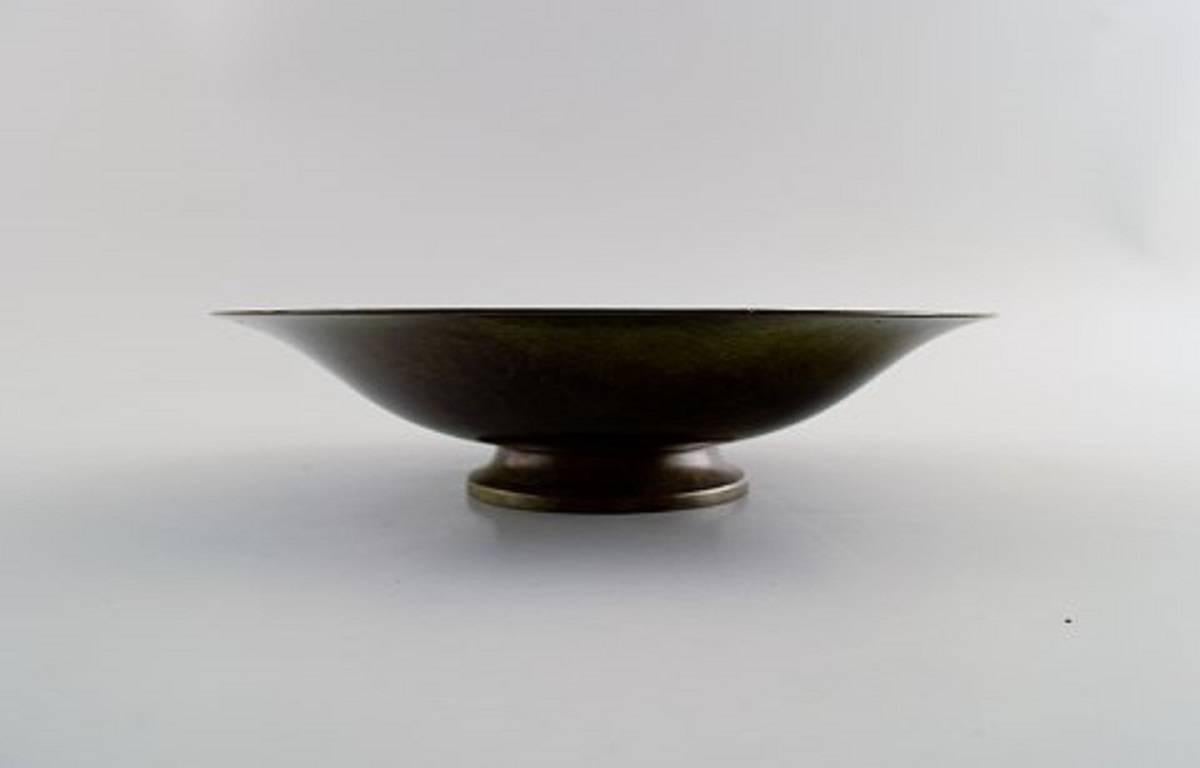 Just Andersen light bronze bowl dish.

Denmark: 1930s-1940s.

Signed LB 1385.

In very good condition, beautiful patina.

Measures: 19 cm. x 5 cm.