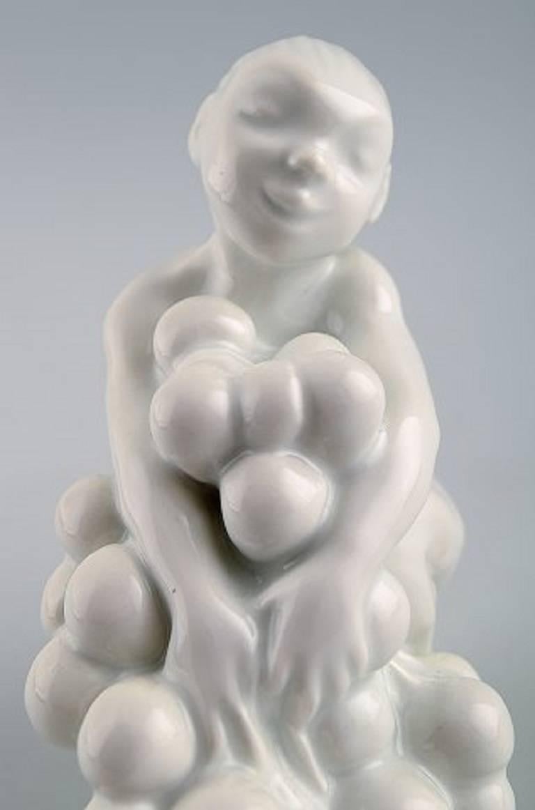 20th Century Bing & Grondahl / B & G, Blanc de Chine Porcelain Figure of Faun with Grapes