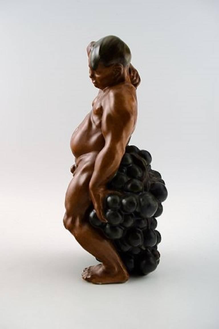 Danish Bing & Grondahl Figurine of a Man Standing with Grapes by Kai Nielsen For Sale