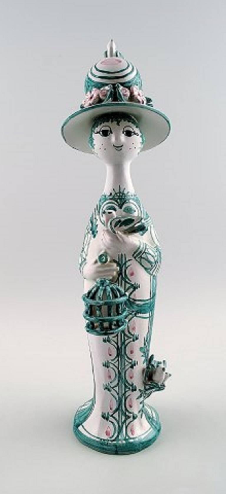 Bjorn Wiinblad 1918-2006. 'The Four Seasons'. Four rare season figures in pottery, decorated in green.

All season figures available in blue as well.

Height: 32-36 cm.

In perfect condition.