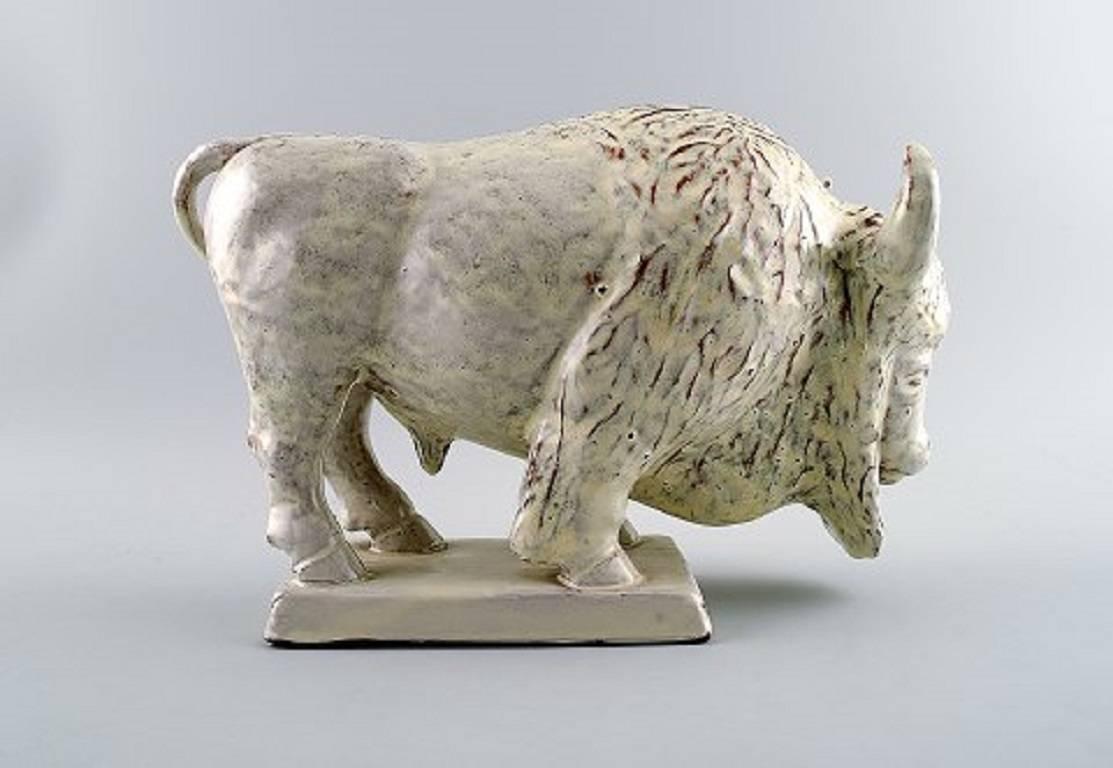 Ovar Nilsson, Bison in earthenware with white glaze.

Signed Ovar Nilsson and marked Höganäs in bottom.

Measures: Height 18 cm., length 28 cm.

In perfect condition.