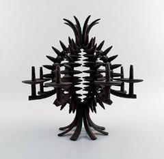 Jens Quistgaard, a Circular, Pineapple Shaped Candlestick of Iron