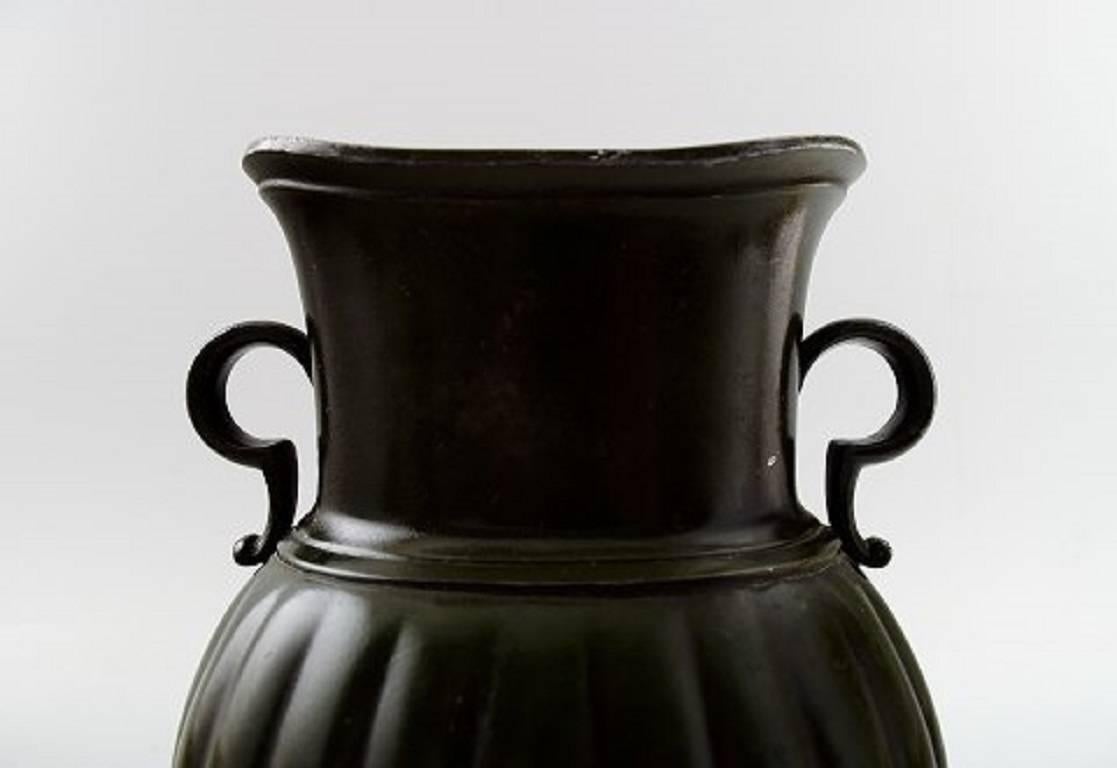 Just Andersen Art Deco vase, number D132.

1930s, Danish design.

Stamped.

Very good condition.

Measures: 18 cm.