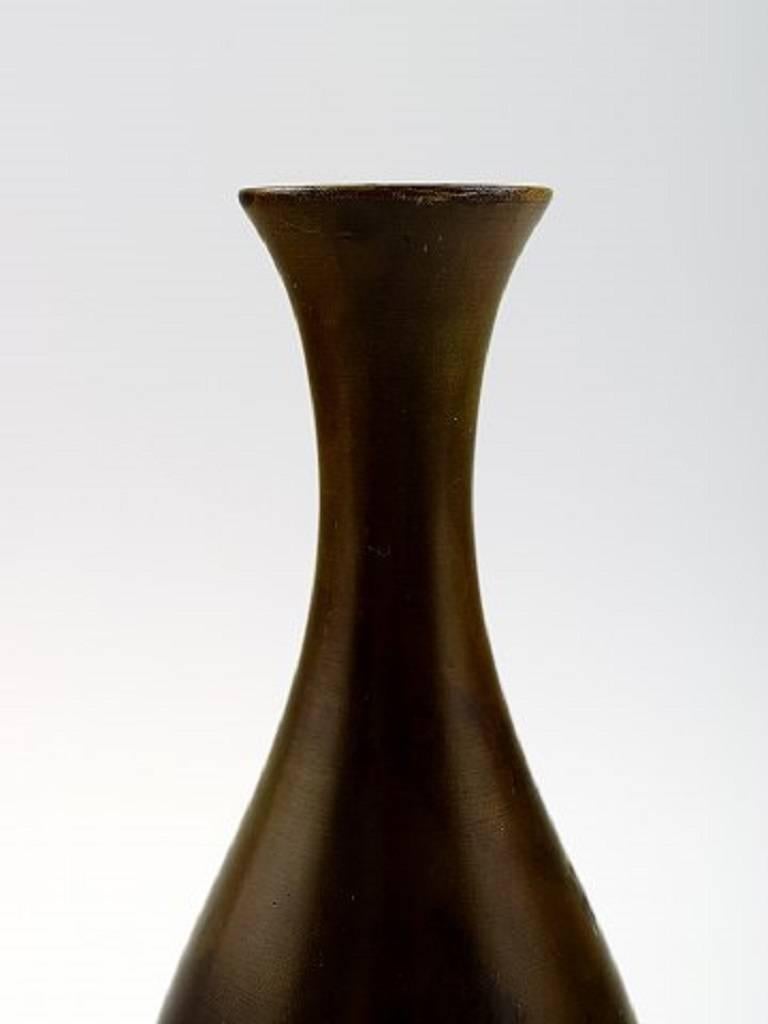 GAB (Guldsmedsaktiebolaget) Swedish Art Deco vase, bronze, 1930-1940s.

Measures: 18 cm. x 7 cm.

In very good condition, beautiful patina.