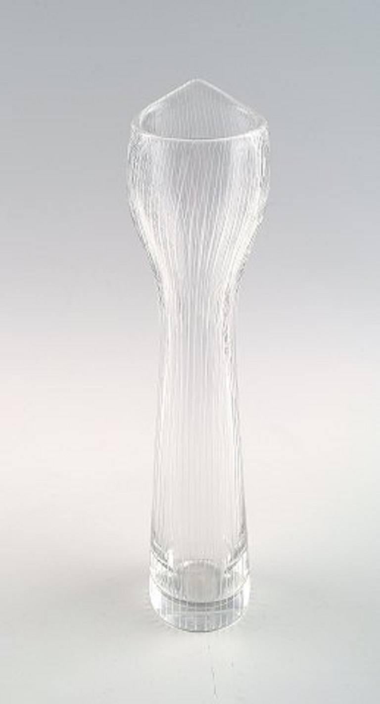 Tapio Wirkkala for Iittala.

Clear art glass vase with engraved decoration in the form of stripes.

Signed Tapio Wirkkala, Iittala, 1957. 

Finland. Finnish design.

Measures: 22 cm. x 4 cm.

In perfect condition.