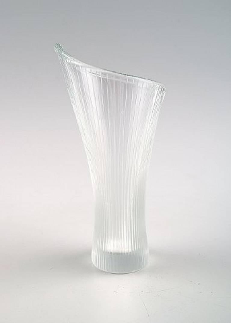 Tapio Wirkkala for Iittala.

Clear art glass with engraved decoration in form of stripes.

Signed Tapio Wirkkala Iittala, 1955, Finland. Finnish design.

Measures: 10.5 cm. x 5 cm.

In perfect condition.