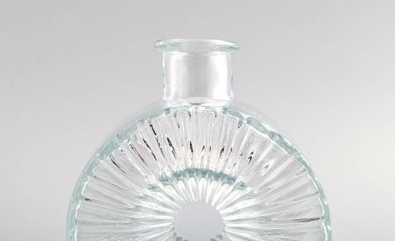 Helena Tynell vase / bottle in art glass, Riihimäen Lasi.

Designed in 1964.

Clear glass

Measures: Height: 12.5 cm. Diameter 9.5 cm.

In perfect condition.

Unsigned.
