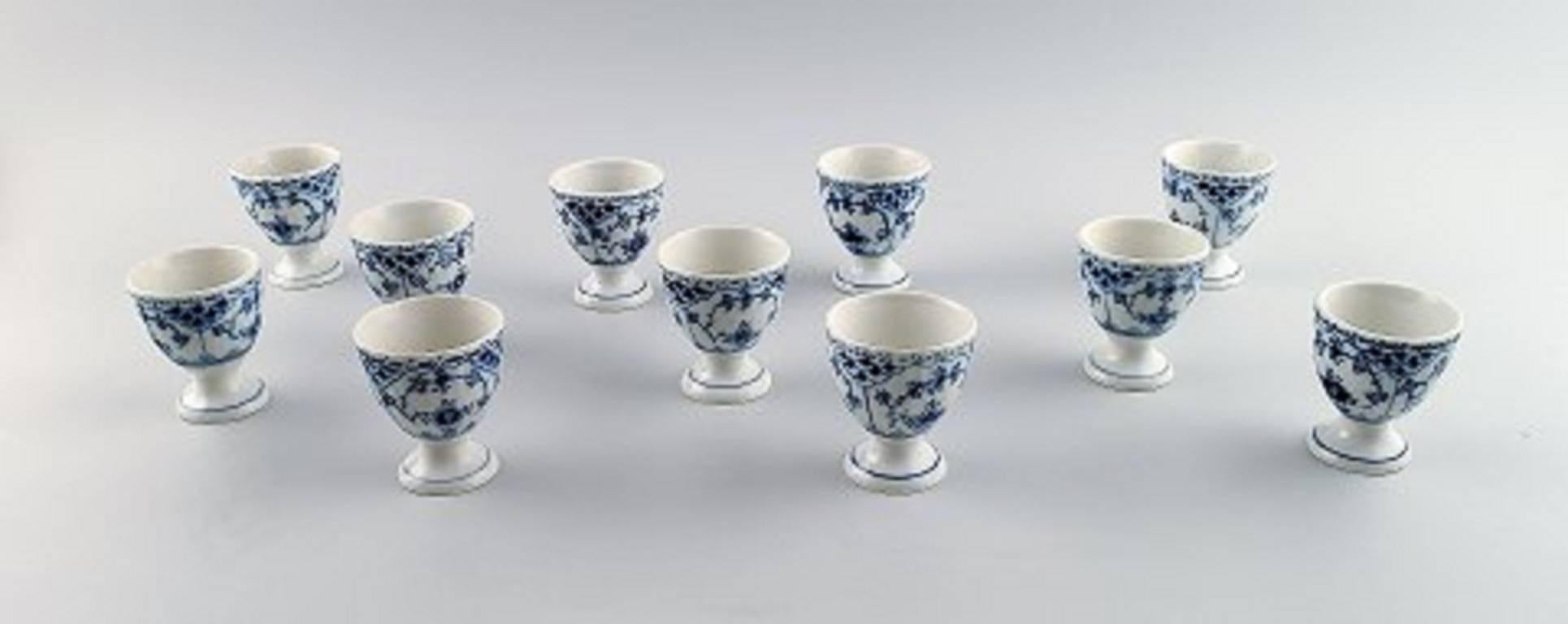 11 Royal Copenhagen blue fluted half lace egg cups.

Produced 1894-1928.

Decoration number 1/542.

1st. factory quality.

Height 5.6 cm.

Perfect condition.