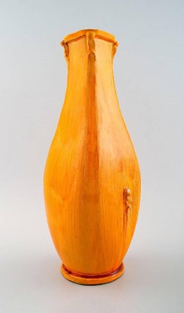 Large Kähler, Denmark, Svend Hammershøi / Hammershoi glazed large vase in stoneware.

In perfect condition.

Beautiful uranium yellow glaze.

Stamped, 1930s.

Measures: 32.5 x 13 cm.