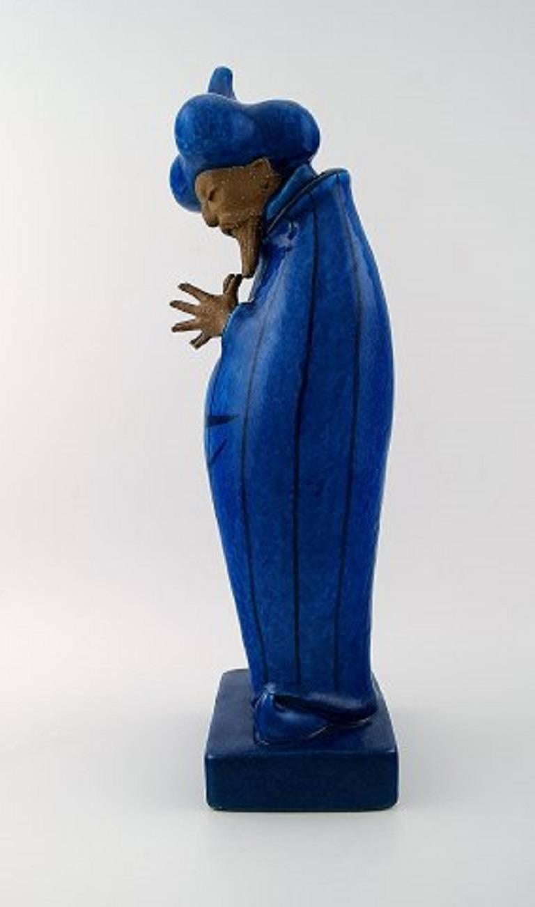 Johannes Hedegaard (1915-1999) for Royal Copenhagen.

'Grand Vizier' figure of partially glazed stoneware.

Signed Johannes Hedegaard, no. 21700. 

Designed in 1959.

In perfect condition. First factory quality.

Height: 44 cm.