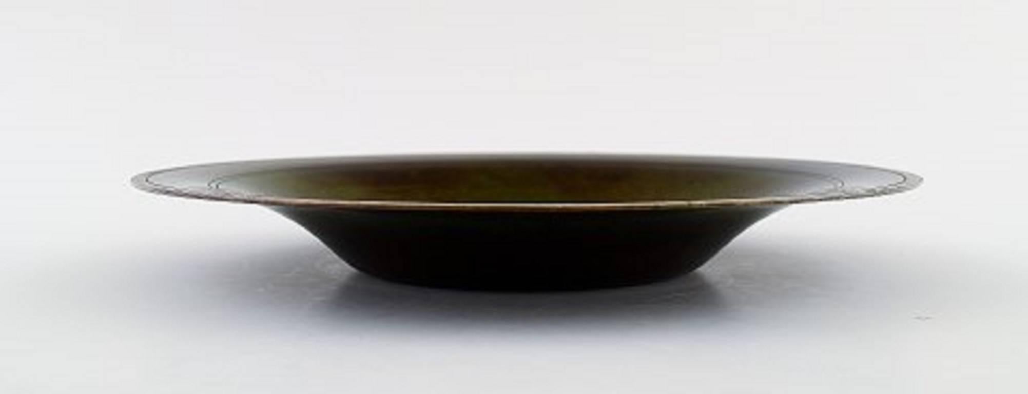 Just Andersen Art Deco bronze bowl or dish,

circa 1930s-1940s.

Signed LB 1614.

In good condition, beautiful patina.

Measures: 21 cm. x 3 cm.