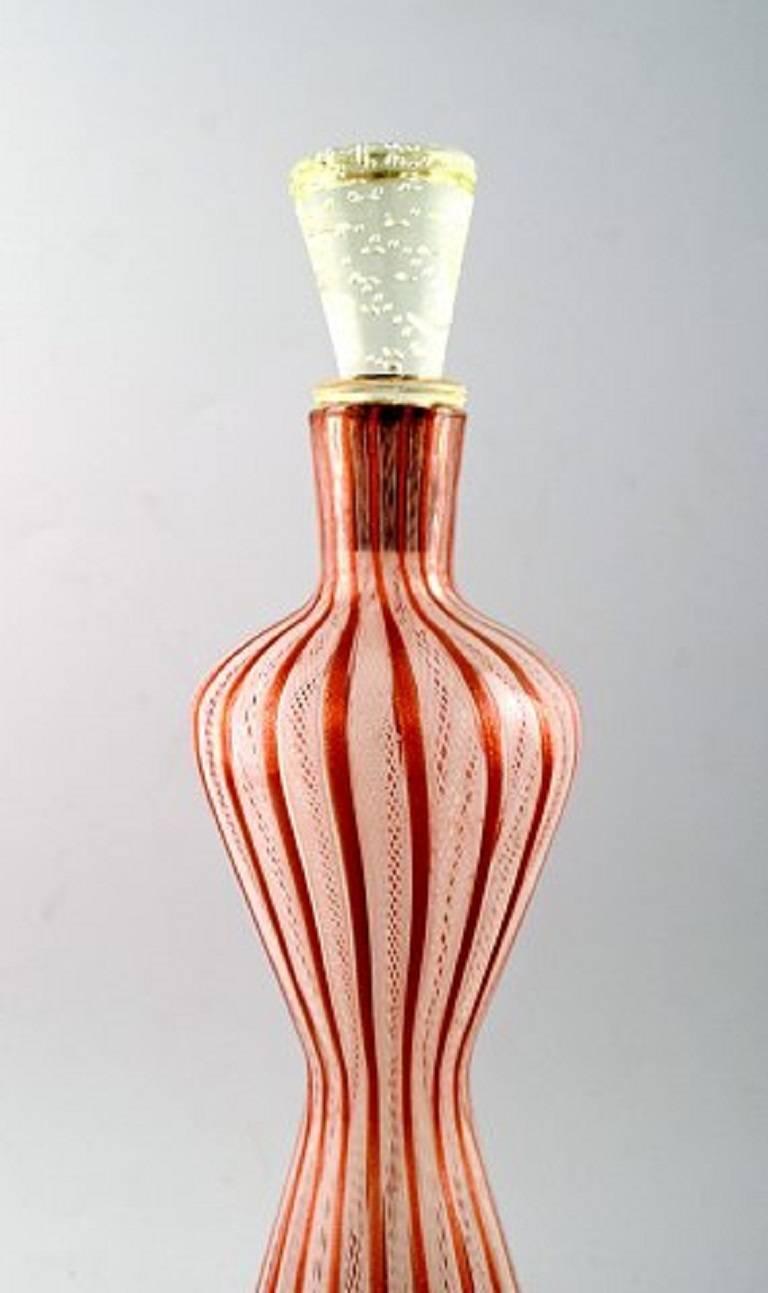Murano decanter / large bottle, Italy, 1960s.

Label from Murano.

In perfect condition.

Measures: 35 x 9 cm.