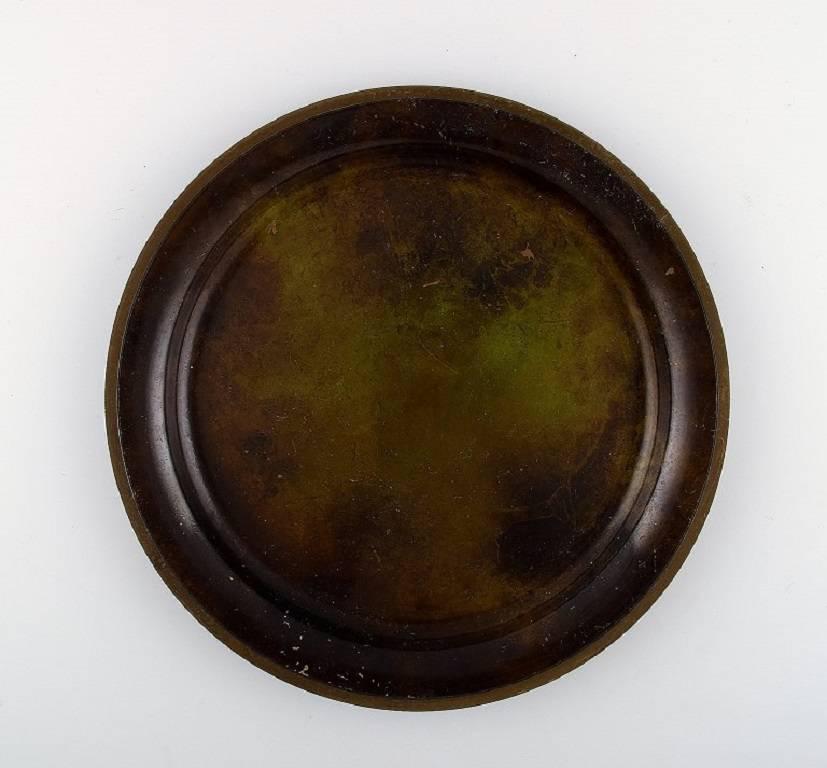Just Andersen, a bronze bowl/dish,

1930s-1940s.

Signed LB 1693.

In very good condition and beautiful patina.

Measures 26 cm. x 2.5 cm.