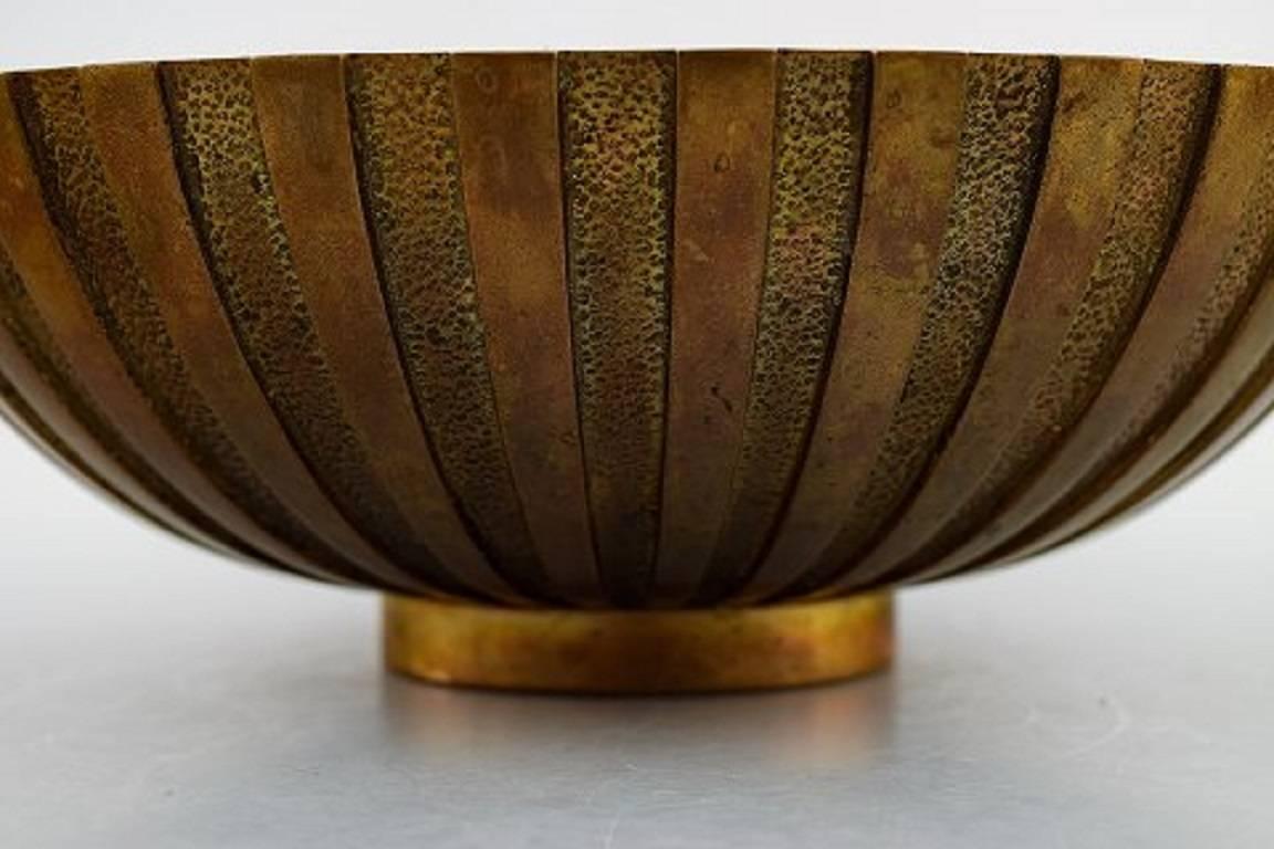 Large Tinos Art Deco bowl in bronze.

Denmark, 1940s.

Stamped.

In good condition.

Measures: 22.5 cm. x 9 cm.