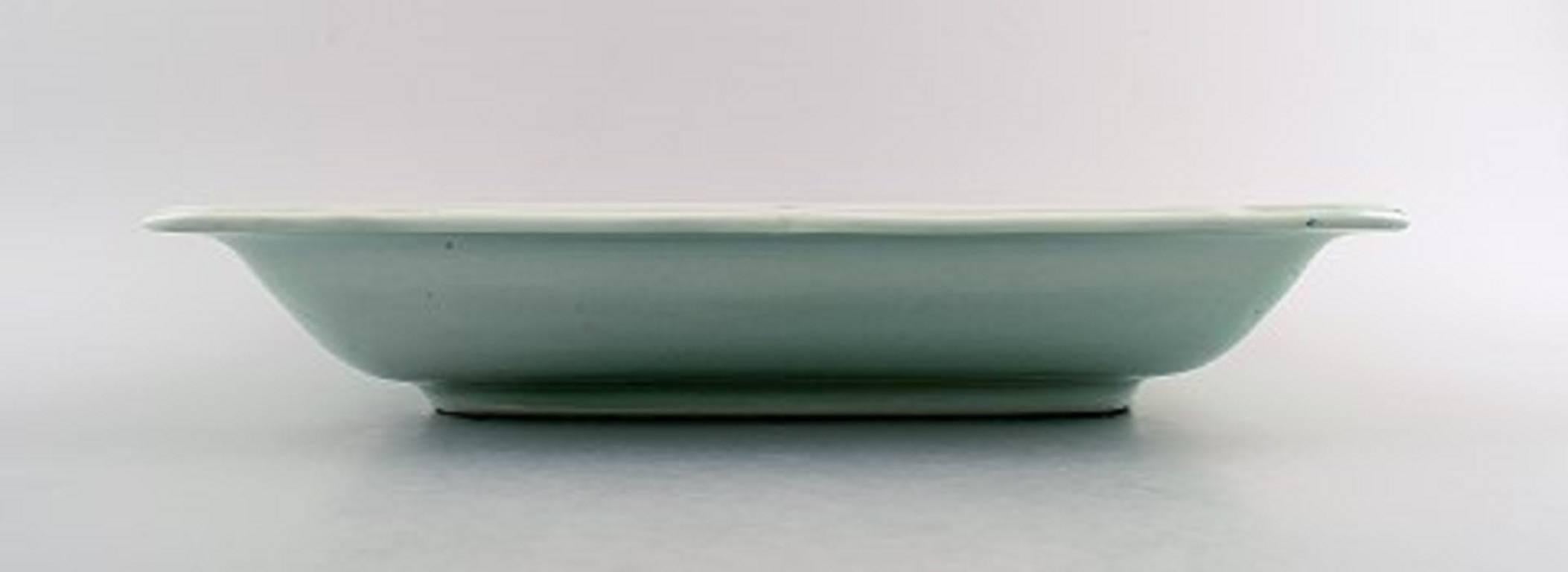 Royal Copenhagen Tranquebar, large square fruit bowl.

Decoration number 3087/1198.

1st. factory quality.

Measures: 29.8 x 29.6 cm x 6 cm.

Perfect condition.