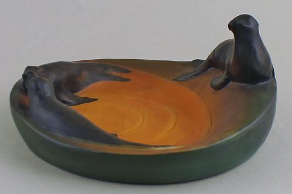 Ipsen's number 148, Art Nouveau ceramic dish with sea lions. 

Measures: 21 cm in diameter. 

In good condition. 

Hallmarked.

   