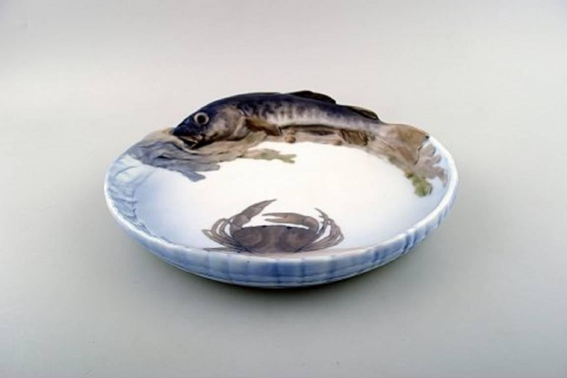 Raro plato de bacalao Art Nouveau de Royal Copenhagen número 1/482.

Medidas: 26 cm. x 24 cm. x 6 cm.

1. Calidad, en perfecto estado.