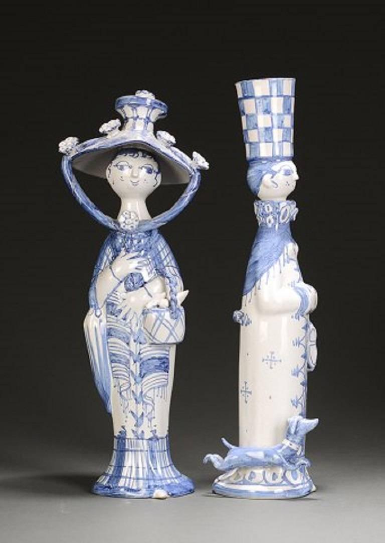 Bjorn Wiinblad 1918-2006. 'The Four Seasons'. 

Four ceramic figurines and decorated in blue. 

Heights: 32-36 cm. 

In perfect condition.