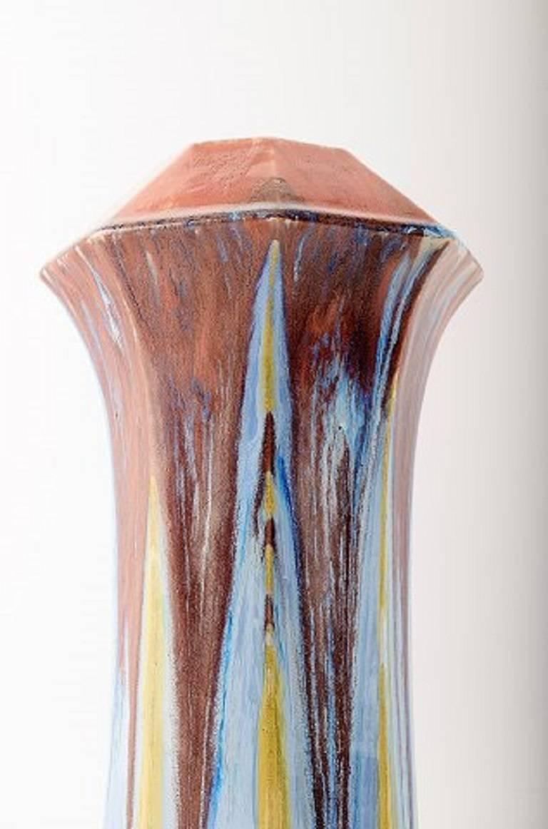 French ceramic vase, circa 1930s.

Beautiful polychrome glaze. 

In perfect condition. 

Measures: 27 cm. 

Signed illegible.