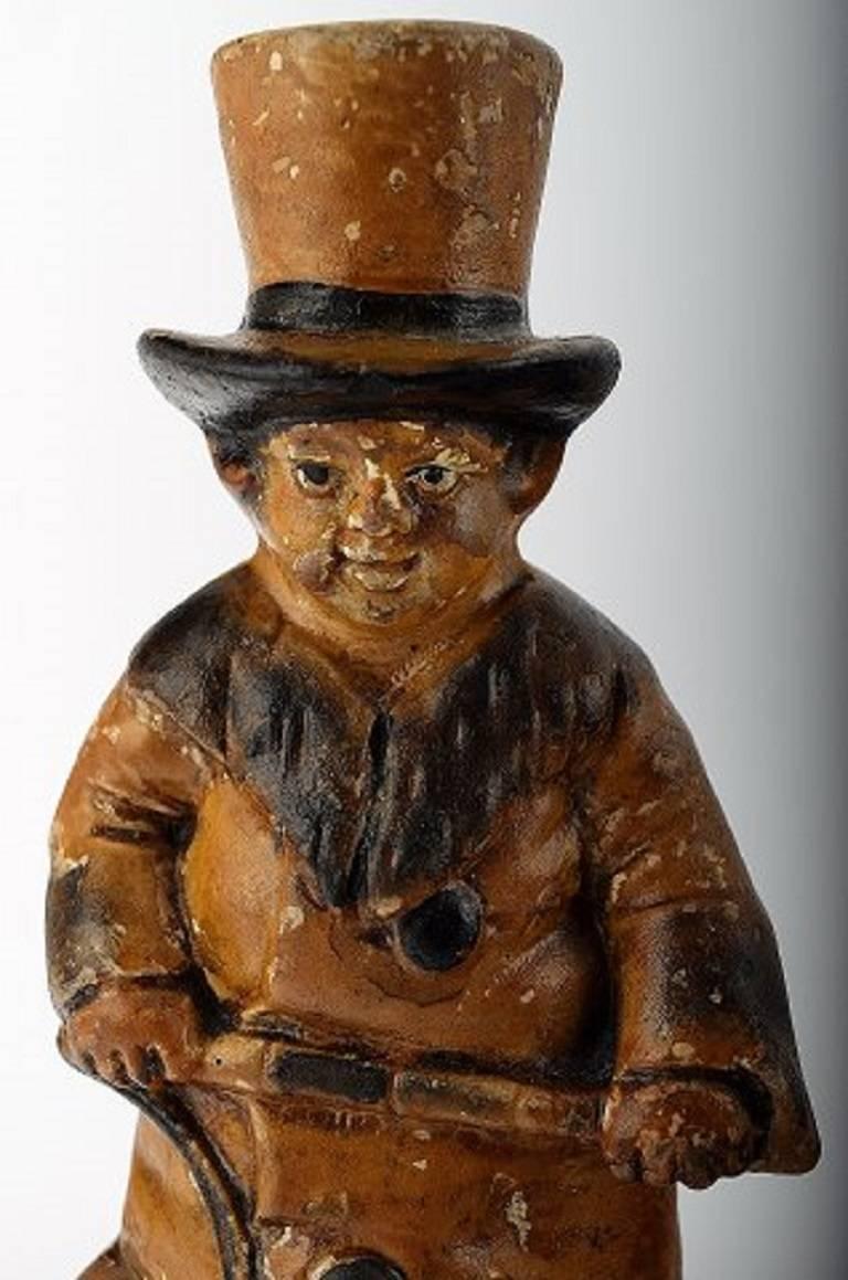 English figure in stoneware after Charles Dickens "Oliver Twist,"

1870s. Charming figurine of character from "Oliver Twist."

Measures: 16.5 cm.

In perfect condition.