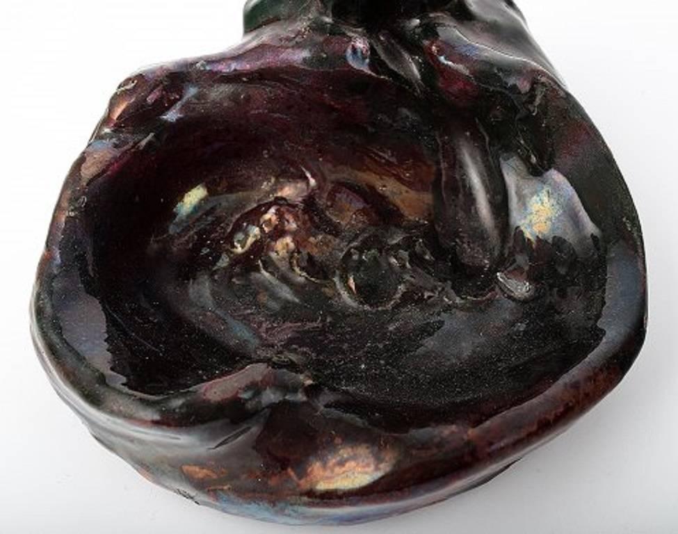 Large and impressive Danish private collection (Total of 42 vases, bowls, figurines, etc.) Soren Kongstrand 1872-1951) and Jens Petersen (1890-1956). 

Polar bear dish, Soren Kongstrand, signed SK. 

Measuring: 14 x 18 cm. 

In perfect