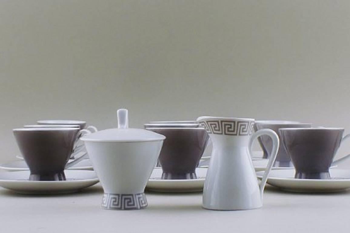 Rosenthal mocha service, nine sets, mocha-cups, saucers, creamer and sugar bowl. 

Beautiful modern coffee service in dark gray and white.

In good condition. 

Size: Mocca cup 6 cm. high. 

Saucer 13 cm. in diameter.