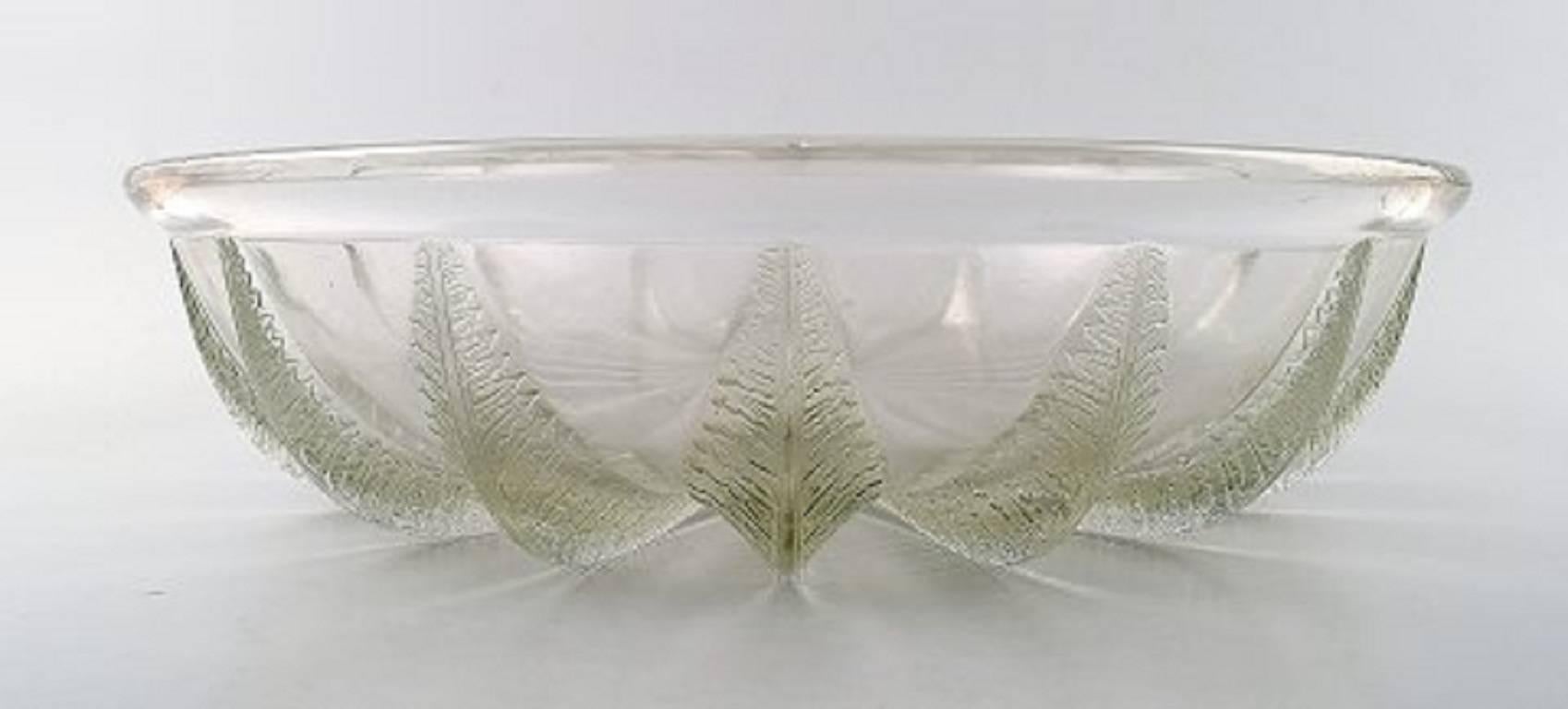 Large Art Deco lalique art glass bowl.

Signed: Lalique France.

Size: 9 cm high, 35 cm. in diameter.

In perfect condition.