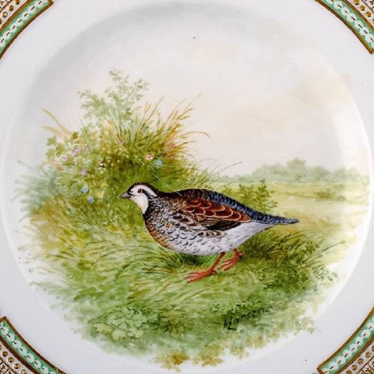 Royal Copenhagen Flora Danica / Fauna Danica dinner plate with motive of a bird in landscape.

Painted in high quality. 25.5 cm. in diameter.

1. Quality, in perfect condition.

Model No. 240/3549.