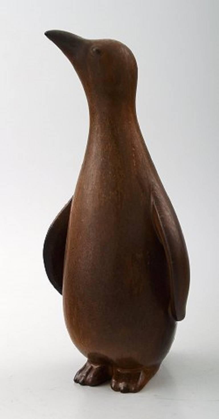Rörstrand stoneware figure by Gunnar Nylund, Penguin.

Sung glaze in brown shades,

1950s.

In perfect condition. 1st. factory quality.

Measures 19 cm.